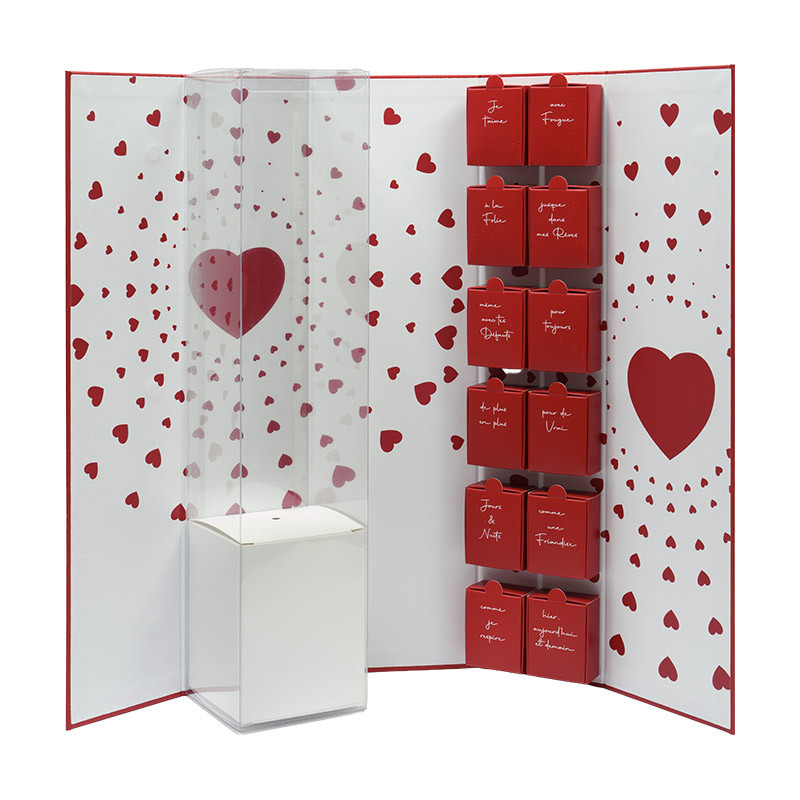 Coffret Rose "Sortilège" : Coffret "Sortilège" aimanté avec 12 petites boîtes et compartiment pour rose ou chocolat. Un packaging envoûtant pour séduire vos clients à la Saint-Valentin.