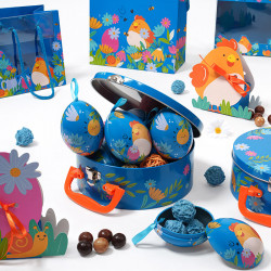 Valise Métallique "Alphonse et Ernestine" Photo numéro 2 : Valise ronde métallique apte au contact alimentaire. Emballage pratique et élégant pour présenter ou offrir vos chocolats de Pâques.