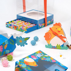 Maryline "Alphonse et Ernestine" Photo numéro 5 : Coffret Maryline avec tiroir et socle amovible. Combine moulages et bouchées de chocolat pour créer un emballage Pâques unique et attractif.