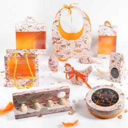 Panier Ovo "Symphonie" Photo numéro 3 : Le Panier Ovo "Symphonie" est idéal pour présenter vos moulages de Pâques. Emballage pratique au design doux, lumineux et subtile pour séduire petits et grands.