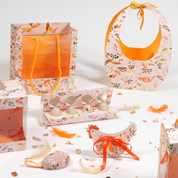 Panier Ovo "Symphonie" Photo numéro 4 : Le Panier Ovo "Symphonie" est idéal pour présenter vos moulages de Pâques. Emballage pratique au design doux, lumineux et subtile pour séduire petits et grands.