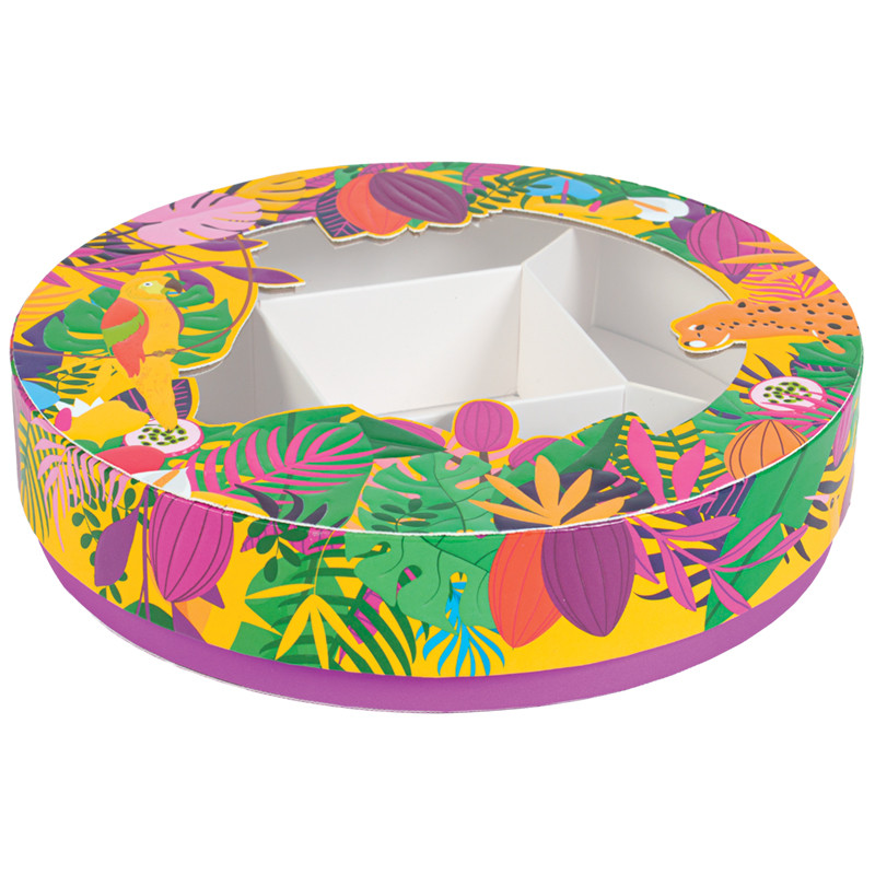 Shirley "Exotique" : Boîte ronde Shirley "Exotique" avec fenêtre transparente, parfaite pour présenter chocolats et gourmandises de Pâques avec style et audace.