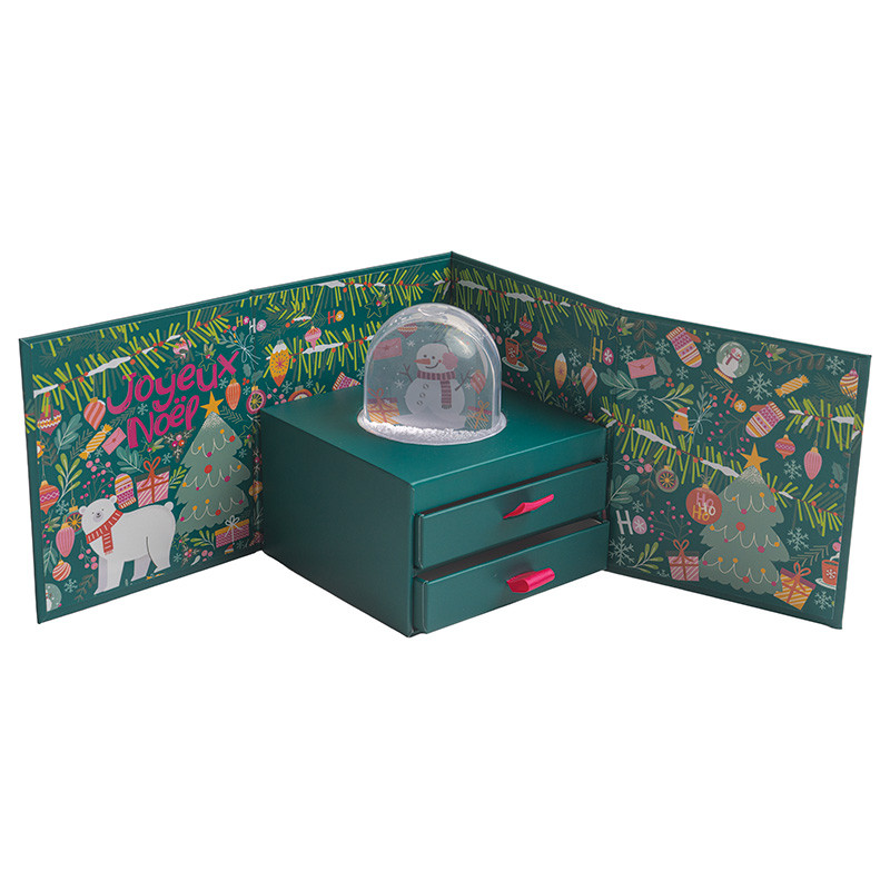 Cyrano "Funky" : Boîte Cyrano "Funky" avec boule à neige pour chocolats, design coloré et festif, avec 2 tiroirs intérieurs blancs pour une présentation originale et ludique.