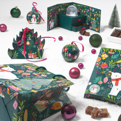 Octave "Funky" Photo numéro 5 : Boîte sapin Octave "Funky", intérieur doré et design coloré, avec 3 compartiments superposables et ruban doré, pour une présentation festive et originale.
