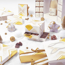 Carnet "Apogée" Photo numéro 4 : Carnet "Apogée" pour chocolats, intérieur imprimé apte au contact alimentaire, avec ruban de fermeture, pour une présentation élégante et raffinée.