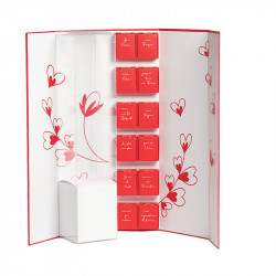Coffret Rose "Coup de Foudre" Photo numéro 2 : Coffret Coup de Foudre aimanté avec 12 petites boîtes et compartiment pour rose ou chocolat. Un packaging envoûtant pour séduire vos clients à la Saint-Valentin