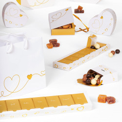 Semainier "J'adore" Photo numéro 4 : Le Semainier de la collection "J'adore" est un coffret composé de 7 cases à ouvrir pour célébrer la fête des amoureux. Packaging de luxe, ludique et petit prix.