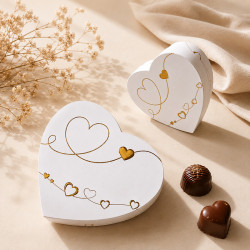 Boîte Cœur "J'adore" Photo numéro 10 : Élégante boîte en forme de cœur au design "J'adore", idéale pour présenter vos créations chocolatées lors de la Saint-Valentin ou autres occasions spéciales !