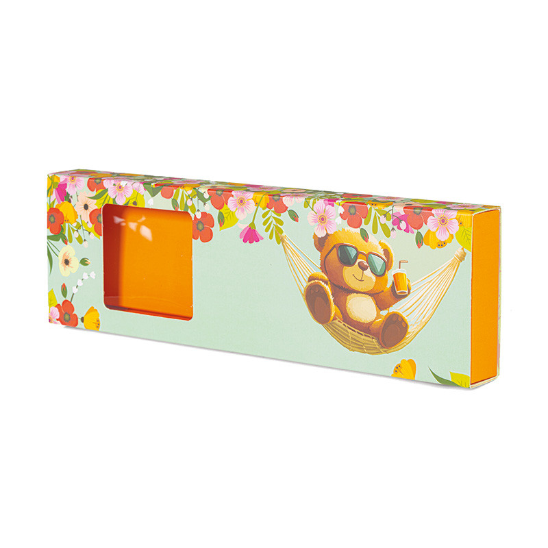 Boîte Oursons Hamac : Conçue pour recevoir 8 oursons en guimauve, intérieur orange, fenêtre transparente et illustration Ourson Hamac pour une présentation fun et gourmande.