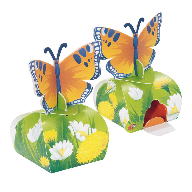 Packaging - avec décor papillons - qui distribue des petits œufs de Pâques